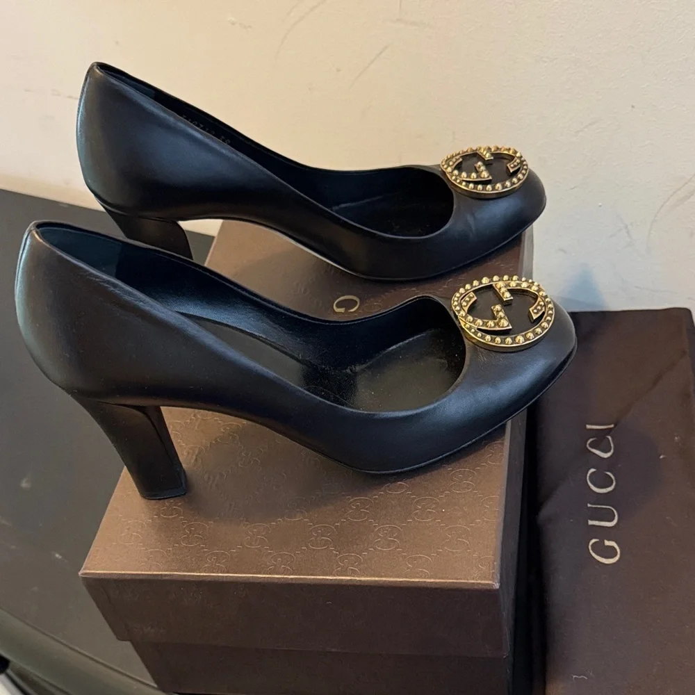 Gucci Black Heels with Iconic Gucci Gold Emblem